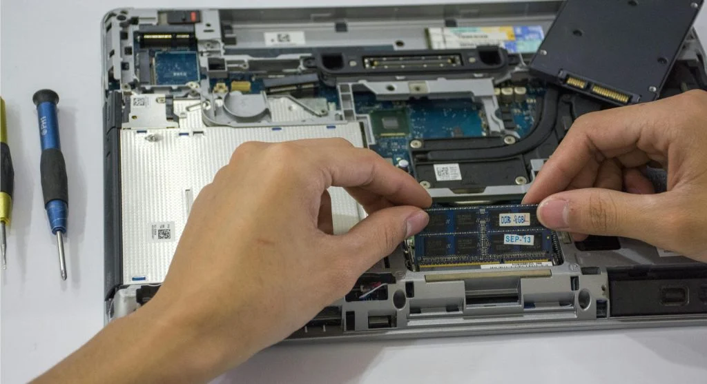 Person checking tech compatibility on a computer
