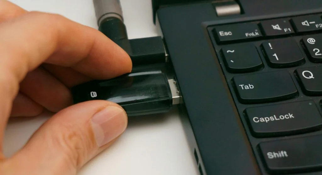 Image of a person compressing files on a computer for file sharing