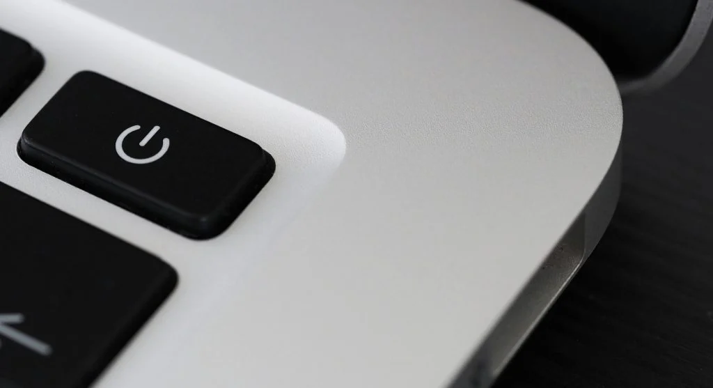 Slow laptop with a loading screen, with a caption about fixing startup apps