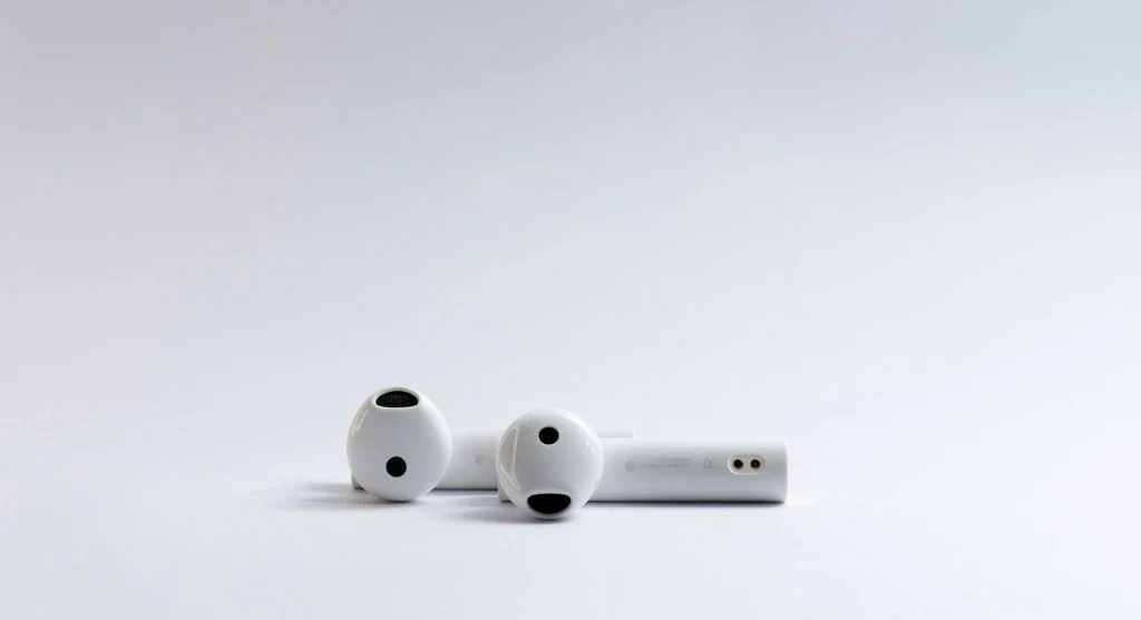 Wireless earbuds in a charging case