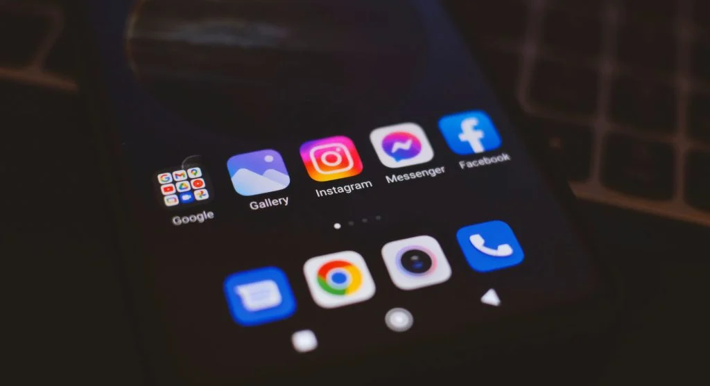 Smartphone home screen filled with many apps