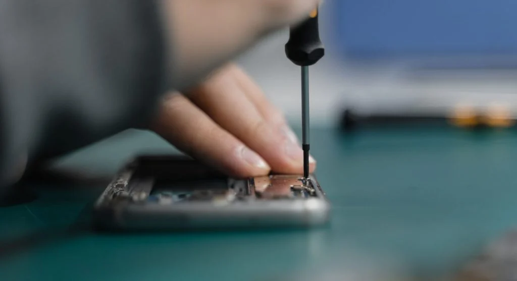 Cleaning smartphone charging port carefully