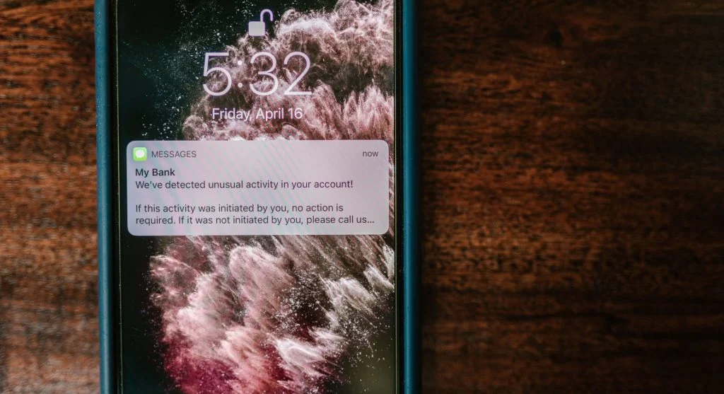 Smartphone showing security alert warning